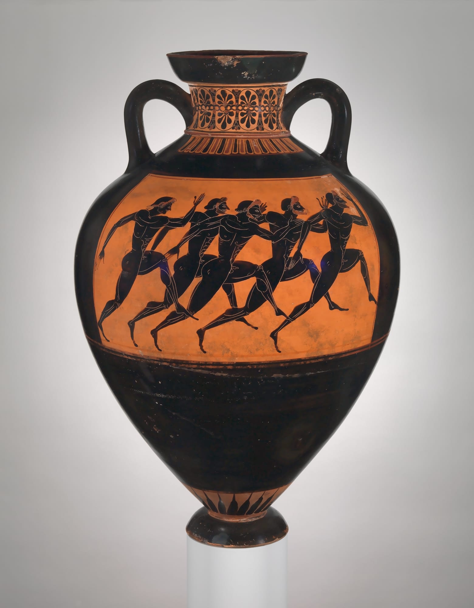 A black-figure amphora with a band of five bearded runners in full stride, painted black on the orange clay.